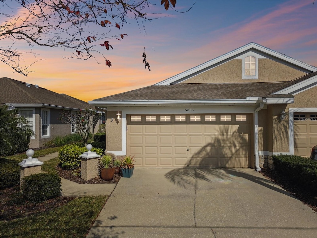 view of front of property featuring a garage