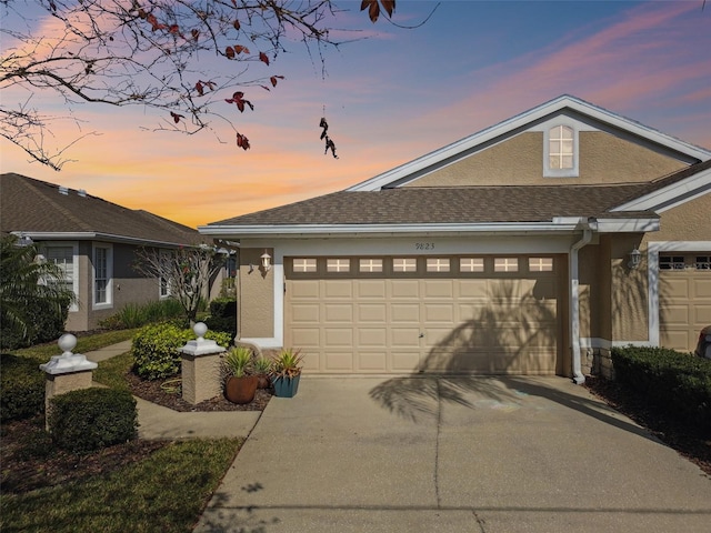 view of front of property featuring a garage