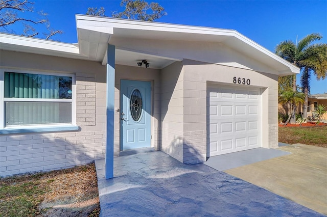 entrance to property with a garage