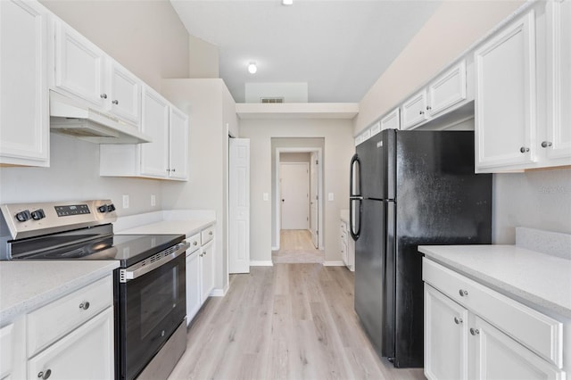 kitchen with black refrigerator, light hardwood / wood-style flooring, white cabinetry, and stainless steel electric range