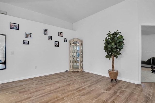 unfurnished room with light hardwood / wood-style floors