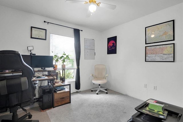 carpeted office featuring ceiling fan and plenty of natural light