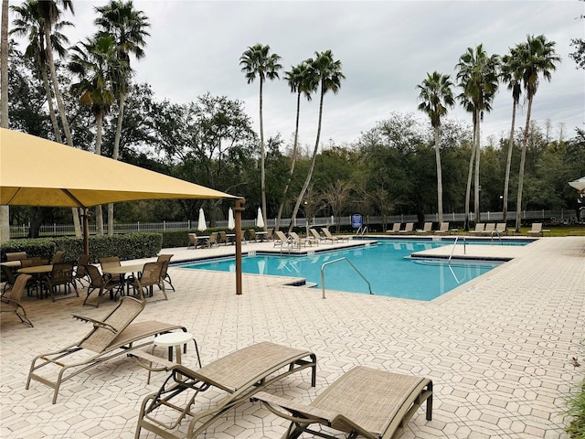 view of swimming pool featuring a patio