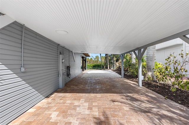 view of patio / terrace featuring a carport