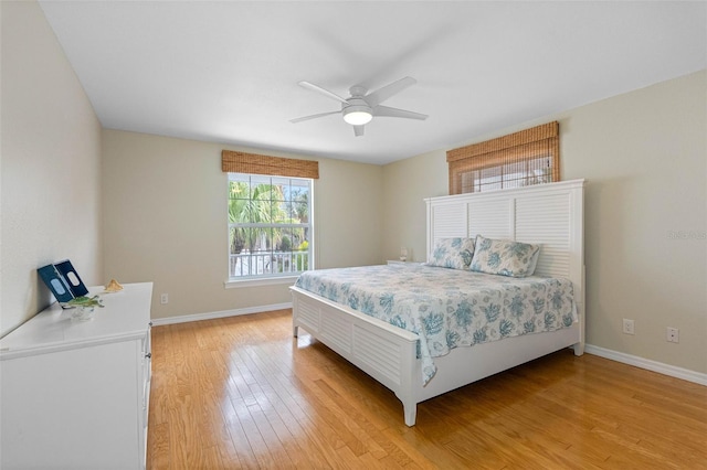 bedroom featuring light hardwood / wood-style flooring and ceiling fan