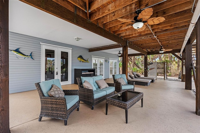 view of patio with an outdoor hangout area, a ceiling fan, and french doors