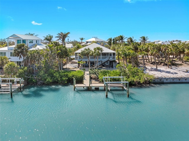 view of dock with a water view and boat lift