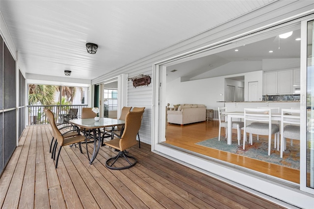 79 Palm Dr, Placida, FL 33946 - wooden terrace with outdoor dining space