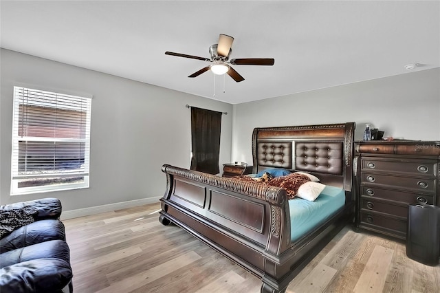 bedroom featuring ceiling fan and light wood-type flooring