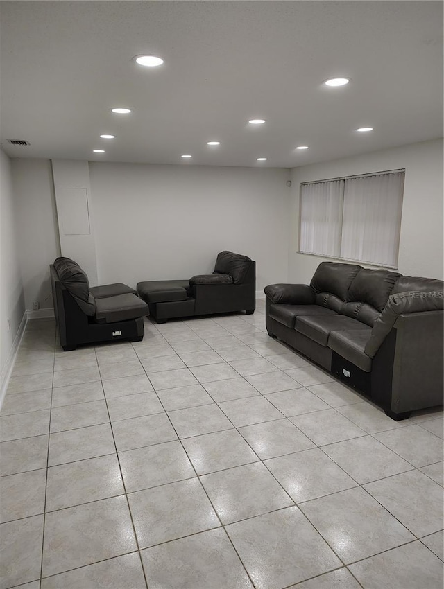 living room with light tile patterned floors