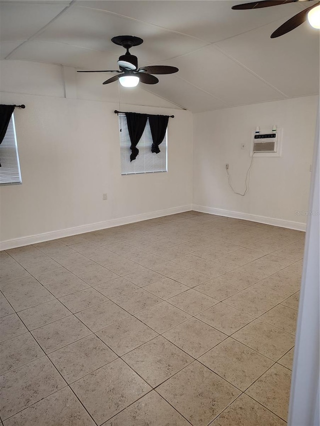 unfurnished room featuring ceiling fan, light tile patterned flooring, and a wall mounted AC