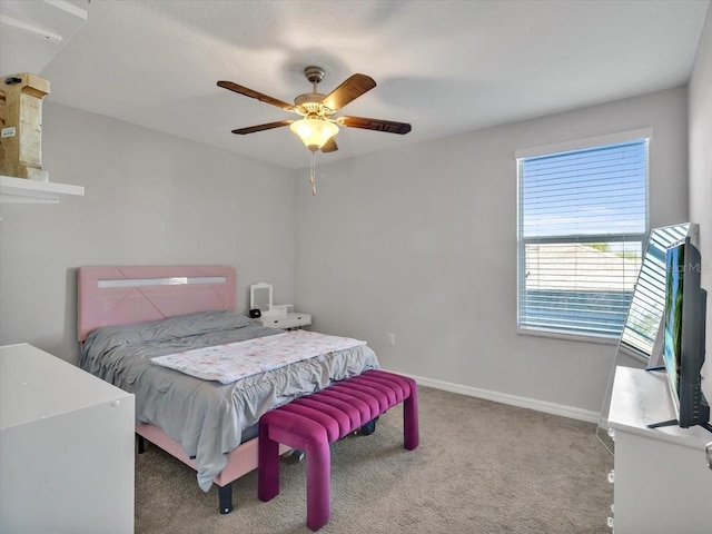 bedroom featuring ceiling fan and light colored carpet