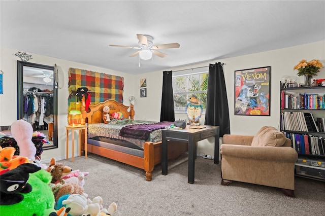 bedroom with carpet, ceiling fan, and a closet