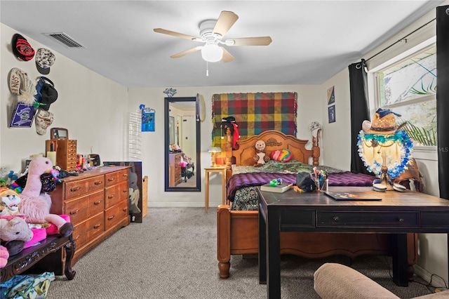 bedroom with ceiling fan and light carpet