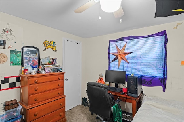 office featuring light carpet and ceiling fan