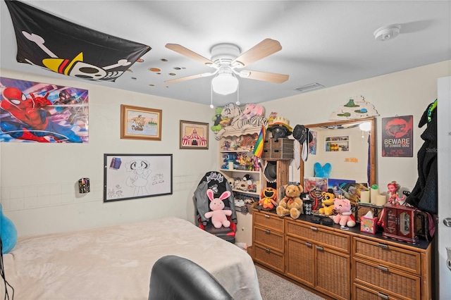 bedroom with ceiling fan and carpet floors