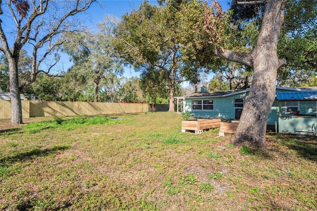 view of yard with a wooden deck