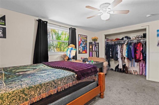 carpeted bedroom featuring ceiling fan and a closet