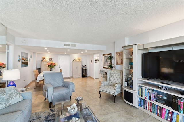 living room featuring a textured ceiling