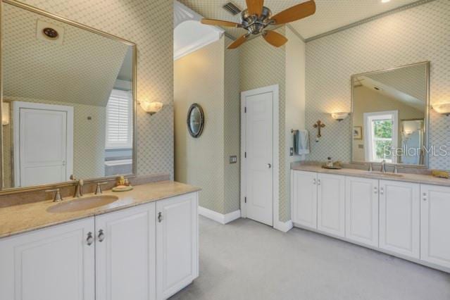 bathroom with ceiling fan, vanity, and ornamental molding