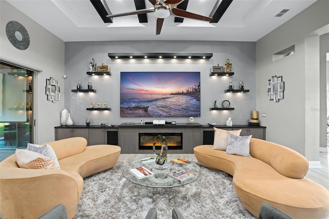 living room with ceiling fan