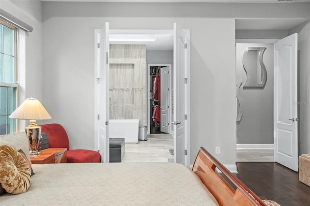 bedroom featuring a closet and hardwood / wood-style flooring