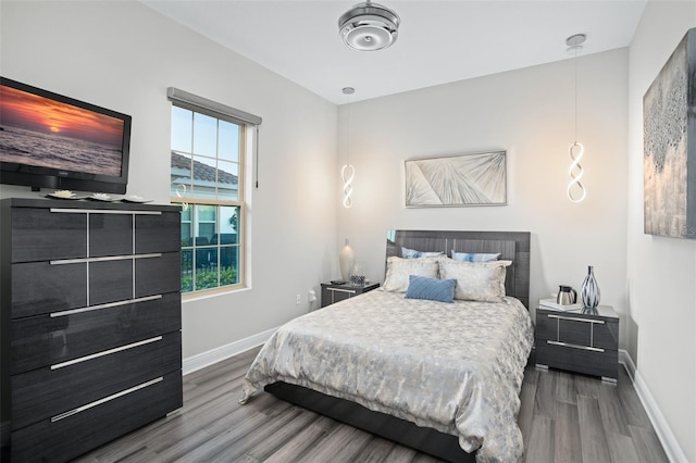 bedroom featuring wood-type flooring