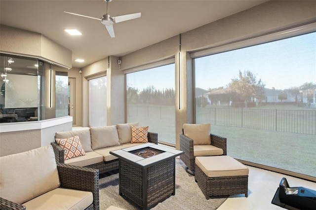 sunroom / solarium with ceiling fan