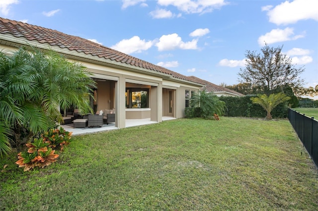 view of yard with a patio and outdoor lounge area