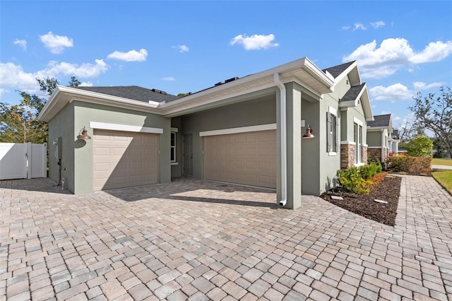 view of front of property with a garage