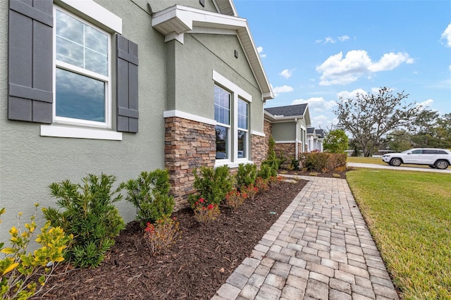 view of home's exterior featuring a lawn