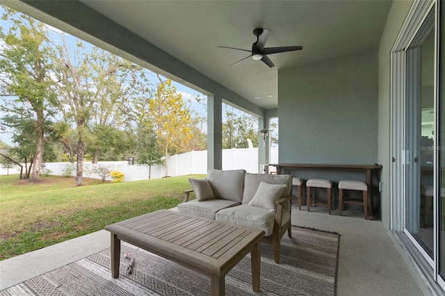 view of patio / terrace featuring ceiling fan and an outdoor hangout area