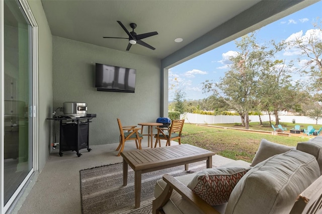 view of patio featuring ceiling fan and an outdoor hangout area