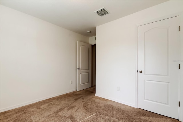 unfurnished bedroom featuring carpet flooring