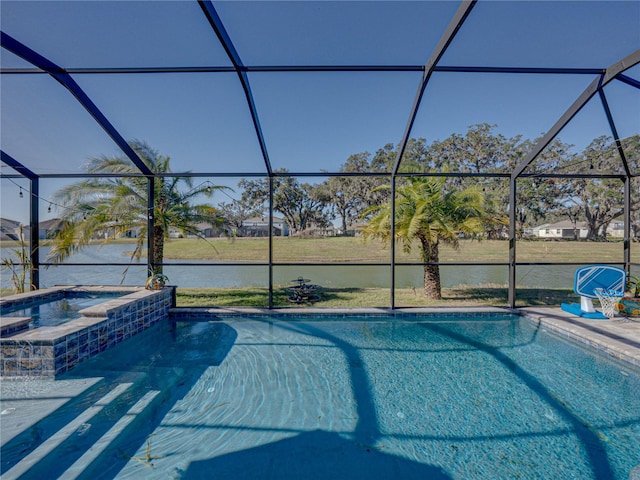 view of swimming pool with a lanai, an in ground hot tub, and a water view