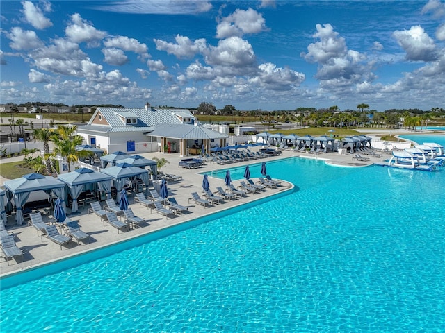 view of pool featuring a patio and a gazebo