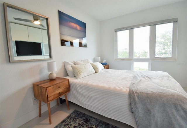 bedroom featuring multiple windows