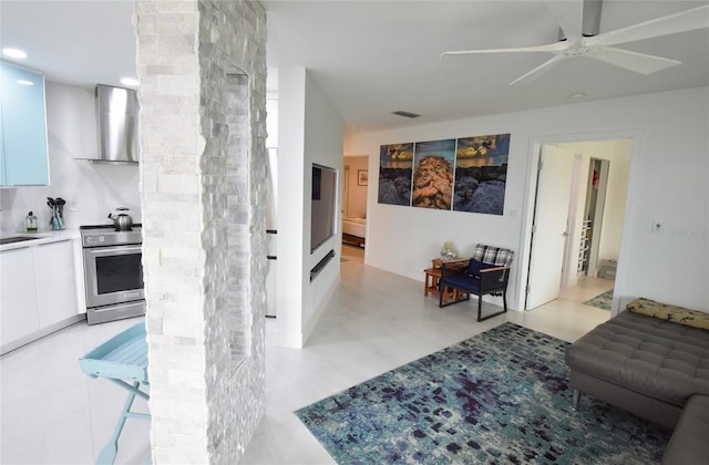 living room featuring ceiling fan