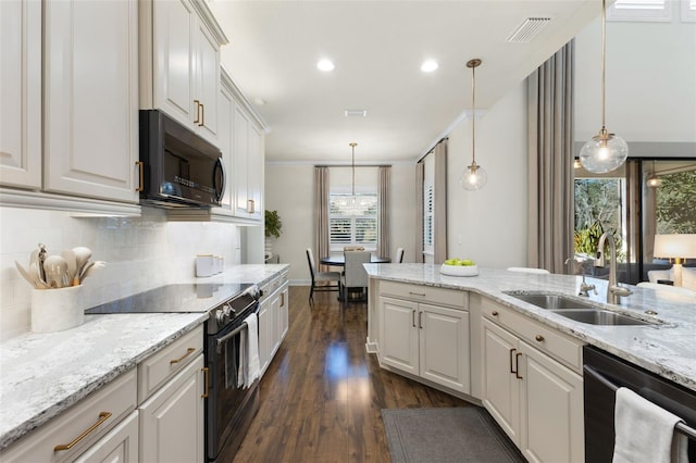 kitchen with visible vents, a sink, black dishwasher, electric stove, and dark wood-style flooring