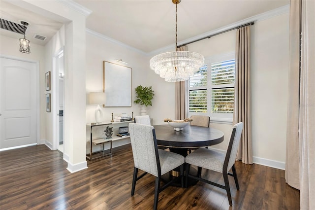 dining area with visible vents, a chandelier, dark wood finished floors, and ornamental molding