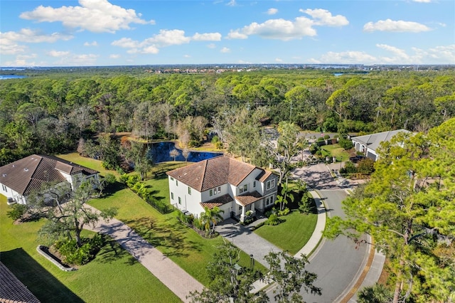 aerial view featuring a forest view