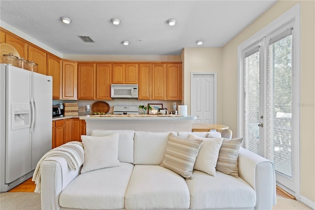 interior space with light hardwood / wood-style floors