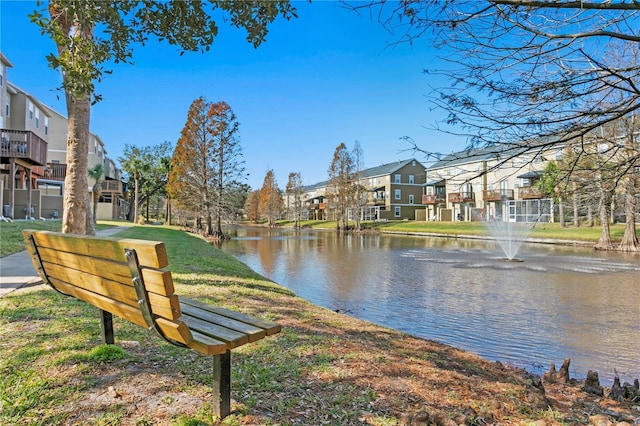 view of home's community featuring a water view