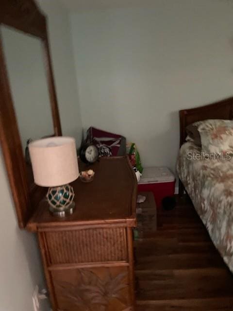 1819 Shore Dr S Unit 203, South Pasadena, FL 33707 - bedroom featuring wood finished floors