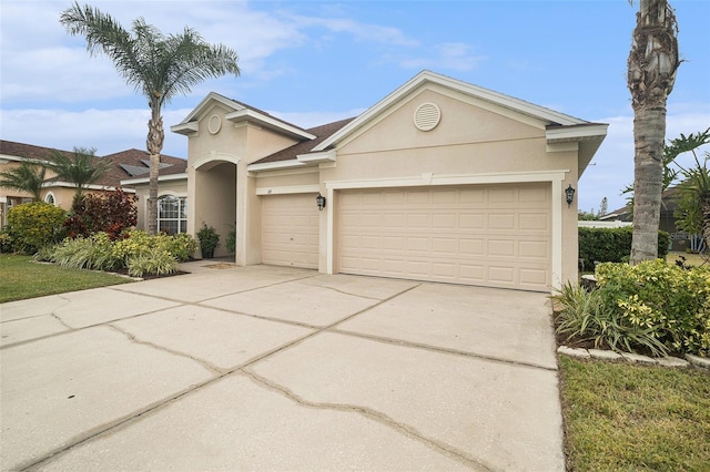 single story home featuring a garage