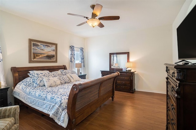 bedroom with ceiling fan and wood-type flooring