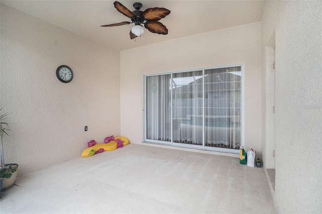 view of patio with ceiling fan