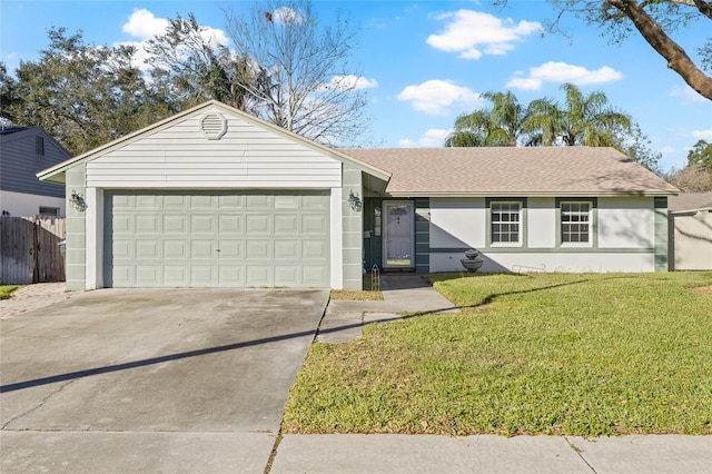 ranch-style home featuring a front lawn and a garage