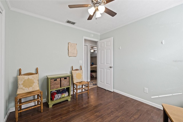 interior space with dark hardwood / wood-style floors and ornamental molding