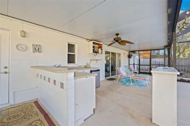 view of patio / terrace featuring ceiling fan